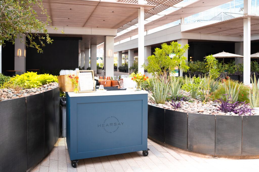 Hearsay branded mobile bar staged for outdoor reception