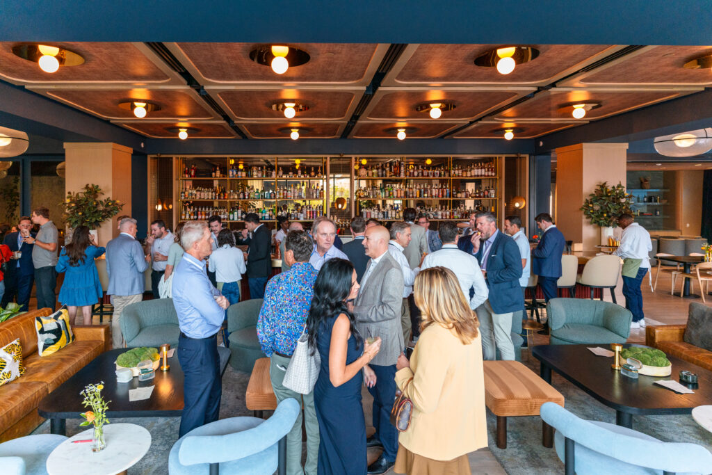 Guests mingling at the Halo Vista celebration at Hearsay