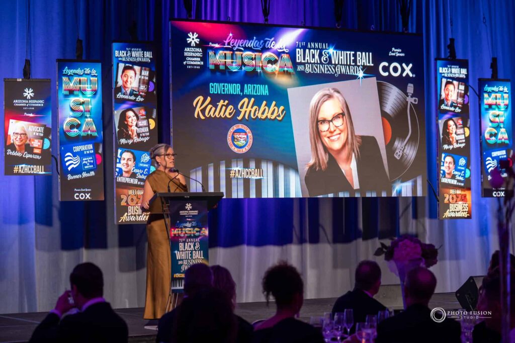 This is a photo taken at the AZHCC annual black and white ball and business awards. This is a group photo of guests during the beginning of the evening when they were all mingling and arriving to the event.