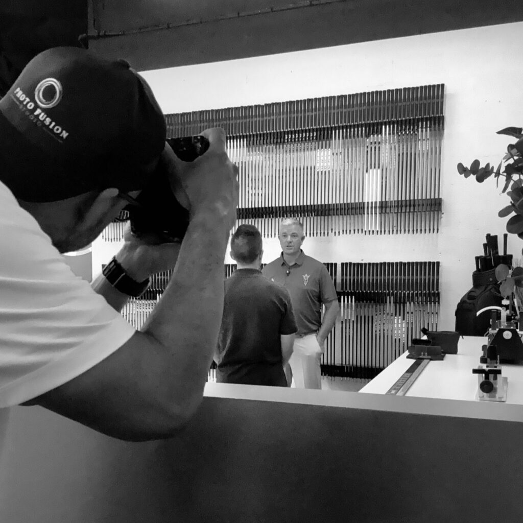 Scottsdale golf photographer Everardo Keeme photographing ASU head coach Matt Thurmond during an interview at True Spec Golf